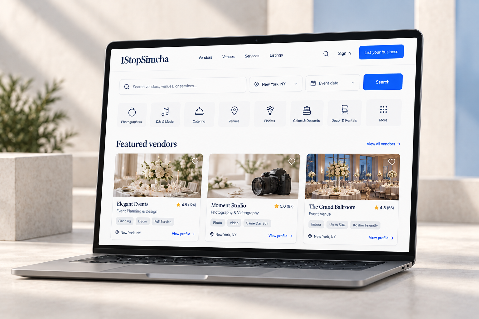 1StopSimcha marketplace shown on a laptop